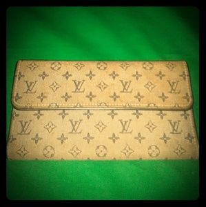 Louis Vuitton Porte Tresor Monogram Canvas wallet